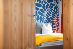 Bunter Hund Apartments - Zentrales Apartment, Parkplatz, Wintergarten, Kinderzimmer